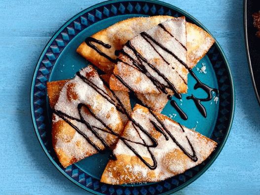 Photo Sopapiyas مع صلصة الشوكولاته