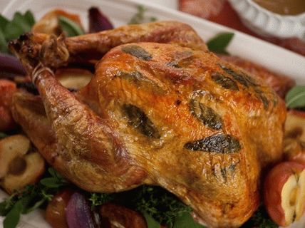 صور الديك الرومي المشوي مع التفاح والحكيم