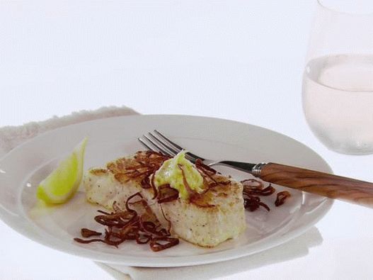 صورة الهلبوت المقلي والكراث بزيت الليمون